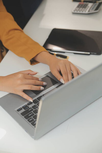 Teamwork with business people analysis cost graph on the desk in the meeting room. The business team discussed meetings and briefing strategies. Negotiation, Analysis, Discussion