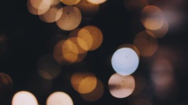 Özgeçmiş, noel, yeni yıl, tatiller ve bayram kutlamaları için soyut çakma ışıklar