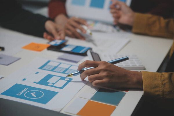 Professional interior designer at workplace in office, closeup