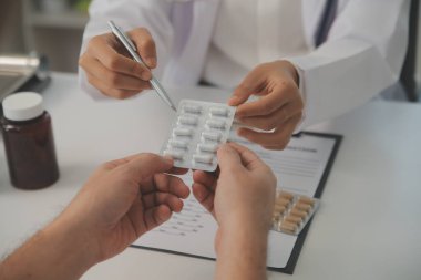 Healthcare service and pharmacy worker with customer at store counter for medication explanation. Pharmaceutical advice and opinion of pharmacist helping girl with medicine information.