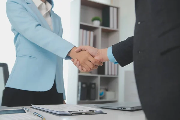 Stock image Close up view of job interview in office, focus on resume writing tips, employer reviewing good cv of prepared skilled applicant, recruiter considering application, hr manager making hiring decision