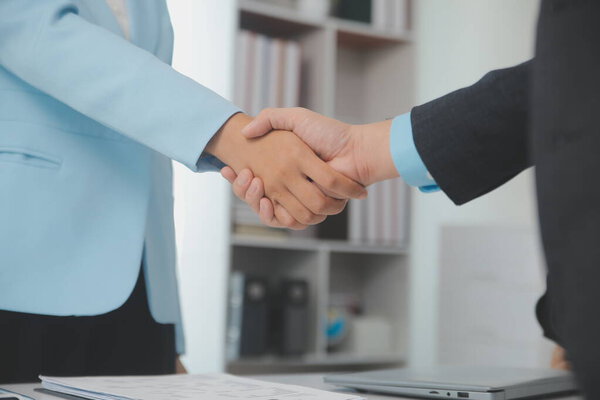 Close up view of job interview in office, focus on resume writing tips, employer reviewing good cv of prepared skilled applicant, recruiter considering application, hr manager making hiring decision