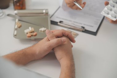 Healthcare service and pharmacy worker with customer at store counter for medication explanation. Pharmaceutical advice and opinion of pharmacist helping girl with medicine information.