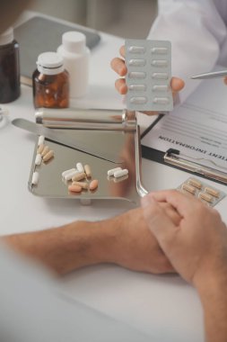 Healthcare service and pharmacy worker with customer at store counter for medication explanation. Pharmaceutical advice and opinion of pharmacist helping girl with medicine information.