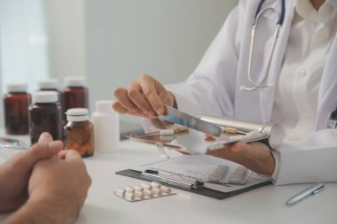 Healthcare service and pharmacy worker with customer at store counter for medication explanation. Pharmaceutical advice and opinion of pharmacist helping girl with medicine information.