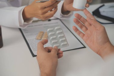Healthcare service and pharmacy worker with customer at store counter for medication explanation. Pharmaceutical advice and opinion of pharmacist helping girl with medicine information.