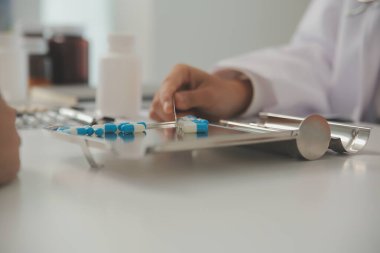 Healthcare service and pharmacy worker with customer at store counter for medication explanation. Pharmaceutical advice and opinion of pharmacist helping girl with medicine information.