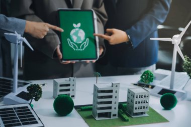 Karbon dengeli fiyat raporu CO2 emisyonu. ESG etik KOBİ ofisindeki gelecekteki büyüme ağı sıfır atığı küresel ısınma sosyal meseleleri projesini koruyor. Bir grup Asyalı SDG 'nin planı