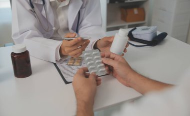 Healthcare service and pharmacy worker with customer at store counter for medication explanation. Pharmaceutical advice and opinion of pharmacist helping girl with medicine information.