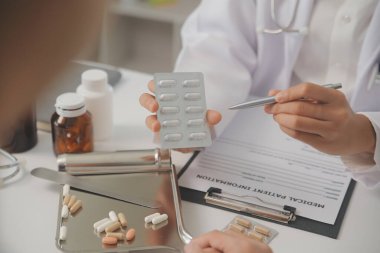 Healthcare service and pharmacy worker with customer at store counter for medication explanation. Pharmaceutical advice and opinion of pharmacist helping girl with medicine information.