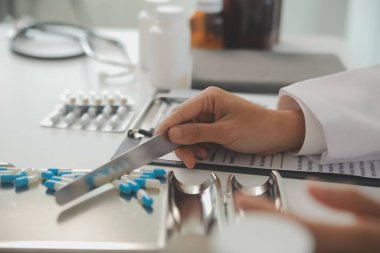 Healthcare service and pharmacy worker with customer at store counter for medication explanation. Pharmaceutical advice and opinion of pharmacist helping girl with medicine information.