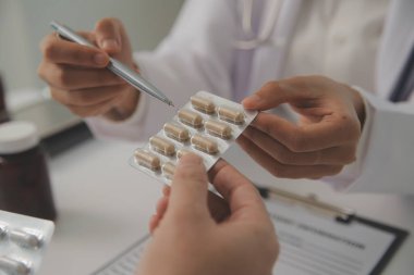 Healthcare service and pharmacy worker with customer at store counter for medication explanation. Pharmaceutical advice and opinion of pharmacist helping girl with medicine information.