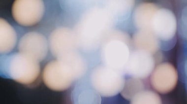 Bulanık Bokeh ışıkları ve gölgesi olan soyut bir arkaplan. Noel ve yeni yıl konsepti.