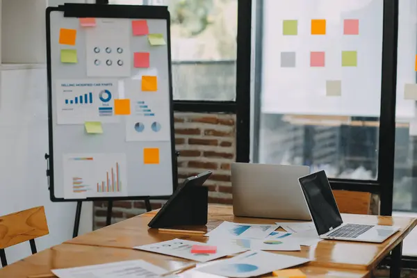 stock image Group of young Asian business people brainstorm collaboration ideas at the office.