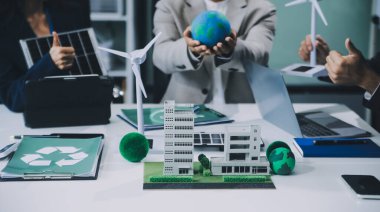 Karbon dengeli fiyat raporu CO2 emisyonu. ESG etik KOBİ ofisindeki gelecekteki büyüme ağı sıfır atığı küresel ısınma sosyal meseleleri projesini koruyor. Bir grup Asyalı SDG 'nin planı