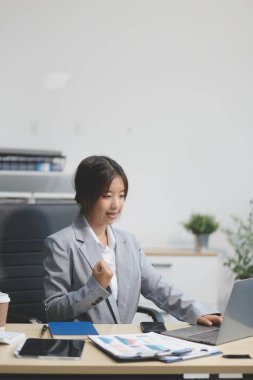 Portrait of smile beautiful business asian woman suit working office desk computer. Small business sme people employee freelance online start up marketing asian designer telemarket successful banner clipart