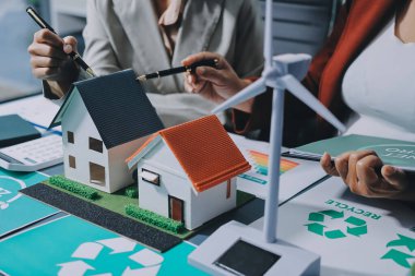 Karbon dengeli fiyat raporu CO2 emisyonu. ESG etik KOBİ ofisindeki gelecekteki büyüme ağı sıfır atığı küresel ısınma sosyal meseleleri projesini koruyor. Bir grup Asyalı SDG 'nin planı