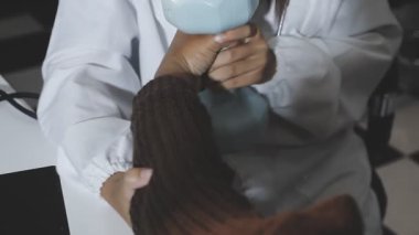 close up of a woman 's hands in the office