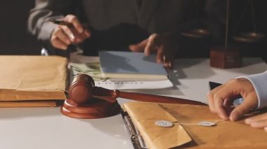 close up of lawyer holding a gavel