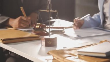 business team working on documents and working on desk in office