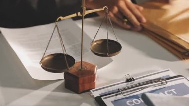 business people are signing contract to buy a contract in real estate.