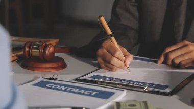 businessman with contract on table