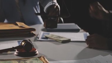 businessman with gavel and money