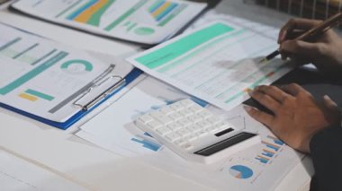 business woman analyzing financial data on computer