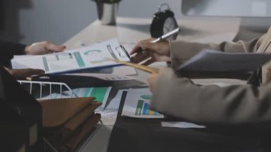 young businessman working at the desk in his office