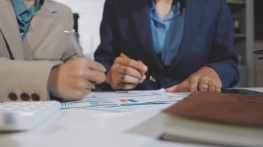 businesswoman working in office with laptop and document.