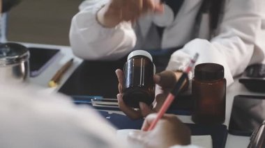 close up of a doctor with a syringe