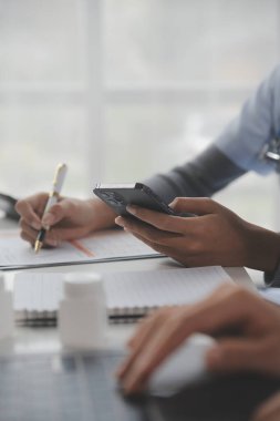 Doctors, nurse or laptop in night teamwork, medical research or surgery planning in wellness hospital. Talking, thinking or healthcare women on technology for collaboration help or life insurance app