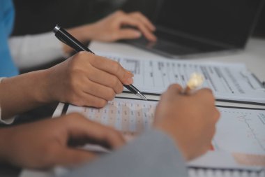 Doctors, nurse or laptop in night teamwork, medical research or surgery planning in wellness hospital. Talking, thinking or healthcare women on technology for collaboration help or life insurance app