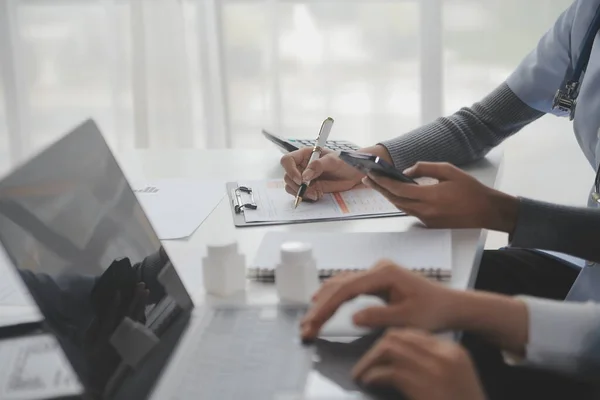 stock image Doctors, nurse or laptop in night teamwork, medical research or surgery planning in wellness hospital. Talking, thinking or healthcare women on technology for collaboration help or life insurance app