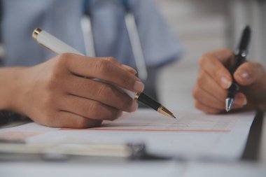 Doctors, nurse or laptop in night teamwork, medical research or surgery planning in wellness hospital. Talking, thinking or healthcare women on technology for collaboration help or life insurance app