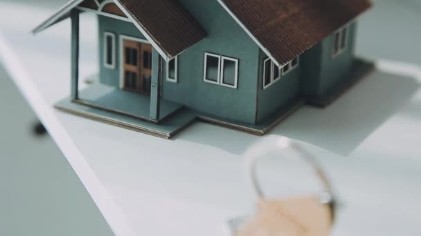 Closeup House Model Wooden Surface Blurred Background — Vídeos de Stock