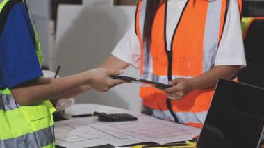 engineer and worker in the factory.