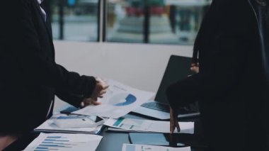 businessman working with laptop in modern office.