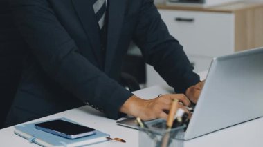 businessman working with laptop in modern office