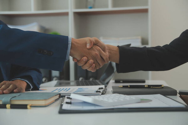 Team of business people are meeting to analyze data for marketing plan,Market research reports and income statistics, Financial and Accounting concept.