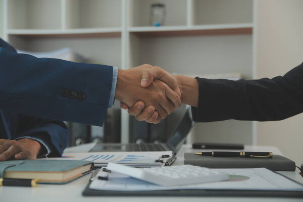 Team of business people are meeting to analyze data for marketing plan,Market research reports and income statistics, Financial and Accounting concept.