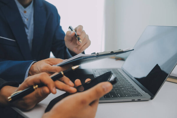 Team of business people are meeting to analyze data for marketing plan,Market research reports and income statistics, Financial and Accounting concept.