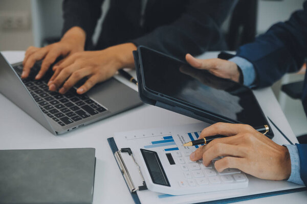 Team of business people are meeting to analyze data for marketing plan,Market research reports and income statistics, Financial and Accounting concept.