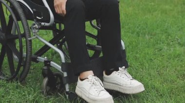 disabled man sitting on a wheelchair