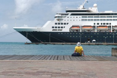 Large Cruise Ship Docked At The Port Of Aruba, Caribbean Islands clipart