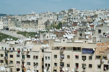 Satellite dishes on rooftops of houses in old town of Fes El Bali, Old Medina & UNESCO World Heritage Site clipart