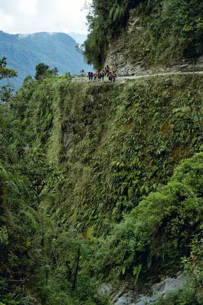 stock image Cyclists sitting down on the Death Road - the most dangerous road in the world, North Yungas, Bolivia.