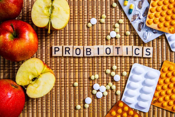 Probiotika Ord Med Bokstäver Äpplen Och Medicin Droger Modern Medicin Royaltyfria Stockfoton