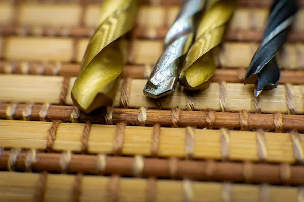macro close up of drills on straw mat background