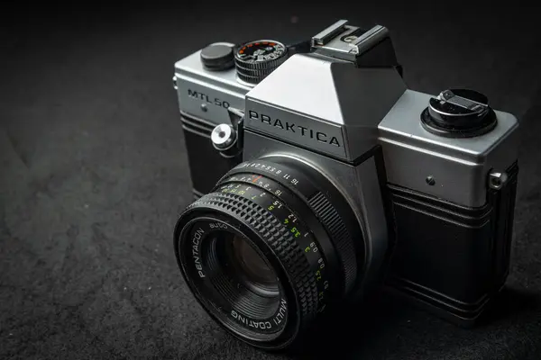 stock image Vintage Praktica German 35mm Film Camera On Black Surface